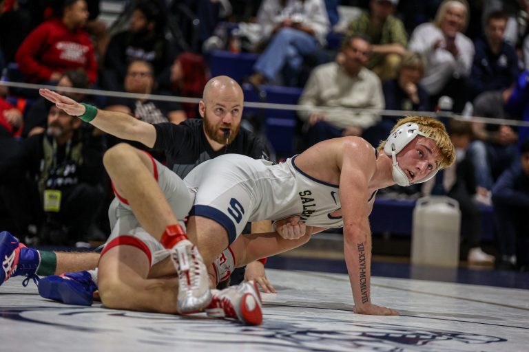 Santino Sianni of Salesianum turns his opponent looking for a pin during his semi-final match at the Delcastle Invitational. Sianni won the 157 pound championship. Photo by Lauren Dickerson